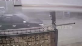 Storm uproots trees and blows away market stalls in southern Thailand