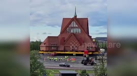 Historic church lifted and moved to new location in Sweden