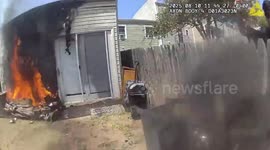 Police rescue owners and pet dog from house fire in New York