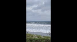 10-foot waves crash during Hurricane Erin in Emerald Isle, North Carolina