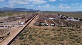 US-Mexico border wall painted black to hinder illegal crossings