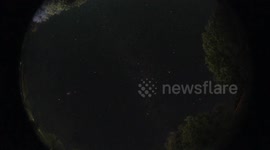 Meteor streaks across night sky above Spain