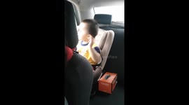 Adorable 3-year-old dances in car seat to catchy song