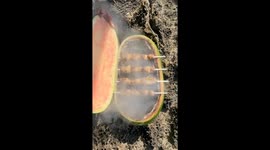 Chef turns watermelon into seaside barbecue pit, racks up 9 million views