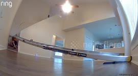 Ring Cam Captures Contractor Slips and Slides Down Stair Railing Like a Human Log