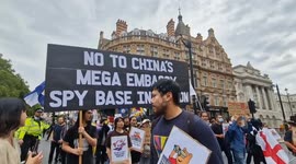 Chinese mega-embassy opponents march in London after decision is delayed