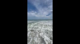 Strong seaside waves at Garden City Beach, South Carolina, USA