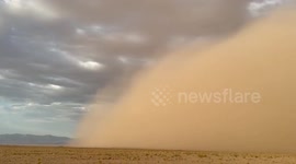 Massive Dust Storm Sweeps Across Red Lake North Of Kingman