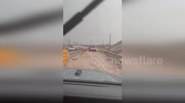 US: Highway Off-Ramp In Texas Submerged As Vehicles Struggle Through Floodwaters