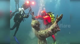 Italy: Divers Teams Dive To Preserve “Christ Of The Abyss” Statue Off Camogli