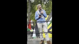 Ben Jamal director of the Palestine Solidarity Campaign speaks at a rally on 22nd August  2025 outside the Israeli Embassy in Kensington, London, Great Britain