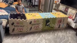 Baby Builds a Coffin-Like House for Dad