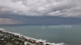 Dark storm clouds form over Floridana Beach, Florida, USA