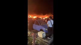 Fire hits repair shop destroying dozens of vehicles in Malaysia