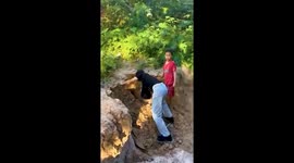 Kindhearted driver rescues boy buried in mud while playing with friends
