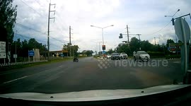 Scooter rider falls to dodge pickup truck hurtling through red light
