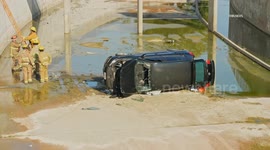 US, Los Angeles: Canoga Park Driver Flees After Car Plunges Into Wash With Sound On Tape