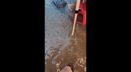 Market flooded as storms bring heavy rain to Taiwan