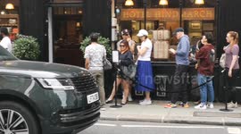 People queue up for really odd ice cream at the Anya Hindmarch cafe in Pont Street