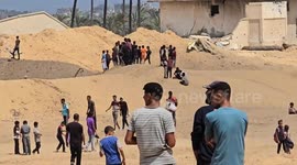 Palestinians rush for humanitarian aid airdropped over Gaza