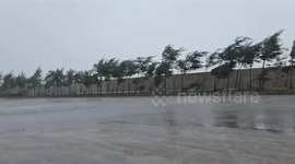 Massive waves from Typhoon Kajiki crash over sea wall in Vietnam