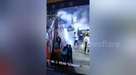 Bystanders rescue pensioner, 65, who falls under moving train