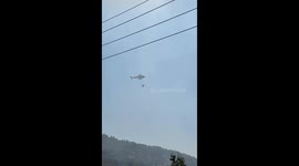 firefighting helicopter come to extinguish a fire in Ibiza