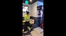Boy punches boxer arcade machine with all his might but gets no results