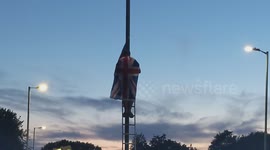 Harlow, United Kingdom – 08/25/2025 – A group of residents gathered along Southern Way in Harlow, Essex, at 8:00 PM to participate in
