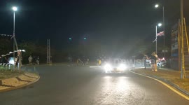 Harlow, United Kingdom – 08/25/2025 – A group of residents gathered along Southern Way in Harlow, Essex, at 8:00 PM to participate in