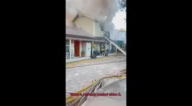Dramatic footage captures first responders tackling a roof fire in Orlando