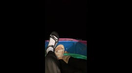 Youngsters stargaze while stuck horizontal on spinning arms fairground ride