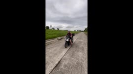 Motorbike lesson goes wrong when woman crashes on first try
