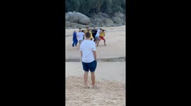 Tourists attack lifeguard after being warned for ignoring beach red flag