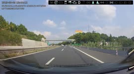 Crane topples on highway narrowly missing car in Sichuan, China
