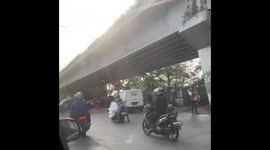 Overloaded motorbike spotted on road in Penang Island, Malaysia