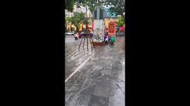 Streets submerged as Typhoon Kajiki hits in Hanoi, Vietnam