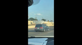 Car Doesn't Pull Over With a Mattress Barely Hanging On