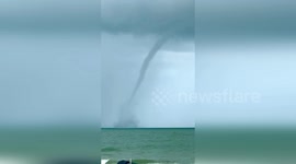 Dramatic Waterspout Forms Off Clearwater Beach