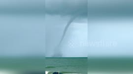 US: Waterspout Swirls Over Clearwater Beach In Dramatic Display