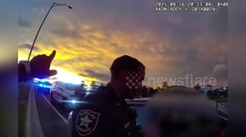 US: Deputy Hitches Ride From Passing Car To Catch Fleeing Suspect