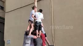 Climbing for the Prize: The Greasy Pole Challenge at La Tomatina