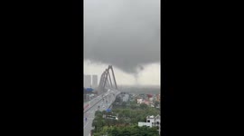 Tornado seen forming near busy highway in Vietnam