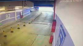 Tesla driver crashes into car park wall