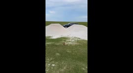 Prairie dog walks to car in West Palm Beach, Florida, USA