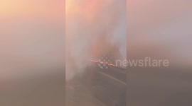 Spain: Helicopter Footage Shows Flames And Smoke Towering Over Igüeña