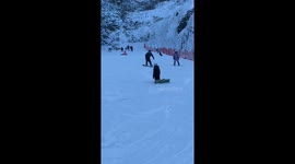 Backward Tumble on the Slopes