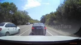 Van driver flees after forcing BMW into oncoming traffic