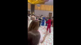 'Corrupt' politicians throw money over each other at party in third world Philippines