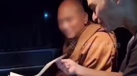 Buddhist monk and psychic arrested for 'fraud and laundering money through temple'
